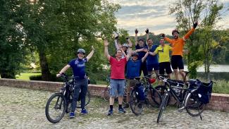 group of people with bikes